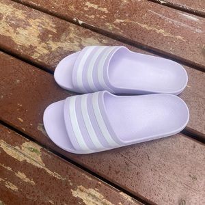 Lilac purple adidas slides
